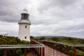 Very old white lighthouse at Cape Naturaliste, Western Australia in overcast weather