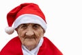 Very old woman 90 years old Mrs Claus with funny expression. Grand-mother or elderly woman with big happy smile wearing Santa Royalty Free Stock Photo