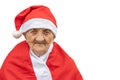 Very old woman 90 years old Mrs Claus with funny expression. Grand-mother or elderly woman with big happy smile wearing Santa Royalty Free Stock Photo