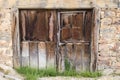Very old wooden door in ancient building Royalty Free Stock Photo