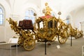 Very ornate gold ceremonial state carriage