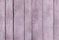 Very pale purple old wooden fence. wood palisade background. planks texture, weathered surface Royalty Free Stock Photo
