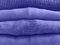 Very peri purple color winter sweaters stack