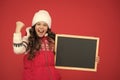 very profitable proposition. happy girl empty blackboard. copy space. useful information here. winter activity Royalty Free Stock Photo