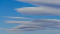 Very rare sighting of several lenticular clouds