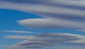 Very rare sighting of several lenticular clouds