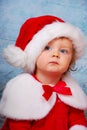 Very serious baby in santa hat Royalty Free Stock Photo