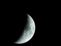 very sharp close-up of the rising crescent moon in the night sky Royalty Free Stock Photo