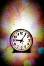 A very simple round black and white clock against colorful background Royalty Free Stock Photo