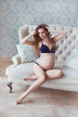 Very skinny healthy pregnant women beautiful model in underwear at bright studio