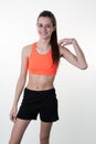 A very skinny woman wearing sport wear with long hair