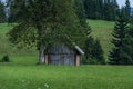 Very small old wooden cottage hut house in pristine nature Royalty Free Stock Photo