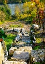 Very steep vineyard staircase made of natural stones with a river in the background Royalty Free Stock Photo