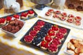 Very sweet delicious small cakes made from berries and figs for candy bar Royalty Free Stock Photo