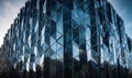 A very tall building with a lot of windows in iceland with faceted volumetric lighting. AI generated