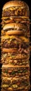 very tall layered burger symbolizing gluttony or a special offer of fast food
