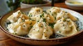 Very tasty manti left on a plate, sprinkled with herbs Royalty Free Stock Photo
