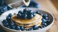 very tasty vegan blueberry pancakes, blueberries on top of pancakes and around, for the restaurant menu Royalty Free Stock Photo