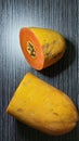 Very tempting pieces of papaya on the table Royalty Free Stock Photo