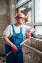 Very tired construction worker resting looking out of the window Royalty Free Stock Photo