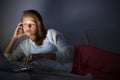 Very tired young woman, burning the midnigh oil Royalty Free Stock Photo