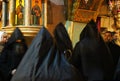 Very unusual black monks ritual in The Church of the Holy Sepulchre Royalty Free Stock Photo