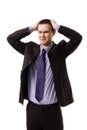 Very upset young man holding head with hands weari Royalty Free Stock Photo