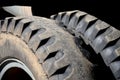 Very used off-road truck tires with two wheels on each axle. missing a sample that is badly worn, the driver can get a fine from t