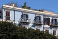 Very well restored facade of an old building with terrace