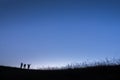 Very wide blue sky background in evening with silhouette people Royalty Free Stock Photo