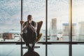 Very worried businessman near window