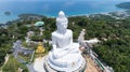 Vesak day background concept of Big buddha over high mountain in Phuket thailand Aerial view drone camera shoot Amazing High angle