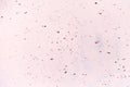 Vesicular rough holey porous texture light pink magenta wall