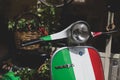 Vespa Piaggio motorcycle with a basket of chilies on display in Tropea, Calabria