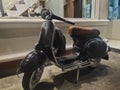 Vespa piagio black retro motorcycle Royalty Free Stock Photo