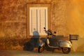 Vespa scooter bike against the backdrop of an old wall Royalty Free Stock Photo