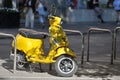 Vespa scooter parked at street