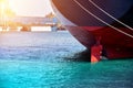 Vessel moored and stern ship with rudder ship alongside