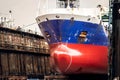 Vessel in a ship repair drydock in the port Royalty Free Stock Photo