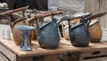 Vessels, teapots in rustic style. Clay crafting, Stoneware, Earthenware, Ceramic art. Tough and practical, utilitarian ware for