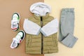 Vest,jumper,hooded sweatshirt,jeans pants with sneakers.Set of baby children& x27;s clothes,clothing,accessories for Royalty Free Stock Photo