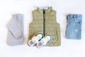 Vest,jumper,hooded sweatshirt,knitted,blue jeans pants with sneakers.Set of baby children's clothes,clothing Royalty Free Stock Photo