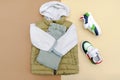 Vest,jumper,hooded sweatshirt,knitted,jeans pants with sneakers.Set of baby children& x27;s clothes,clothing,accessories Royalty Free Stock Photo