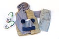 Vest,jumper,hoodie,jeans pants,hat,sneakers. Set of baby children's clothes,clothing and accessories for spring Royalty Free Stock Photo