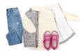 Vest,warm jumper,sweater,jeans pants,pink sneakers. Set of baby children's clothes,clothing for spring,autumn,winter Royalty Free Stock Photo