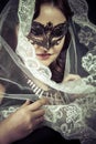 Vestal.Veiled virgin, spirituality concept. woman with mask posing in studio. Royalty Free Stock Photo