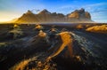 Vestrahorn mountain with black volcanic lava sand dunes at sunset, Stokksnes, Iceland Royalty Free Stock Photo