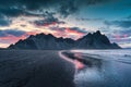 Vestrahorn mountain and dramatic sky over black sand beach on summer at Iceland Royalty Free Stock Photo