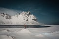 Vestrahorn mountain in south-east Iceland, covered by snow near the beach and sea in the winter