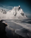 Vestrahorn mountain in south-east Iceland, covered by snow near the beach and sea in the winter